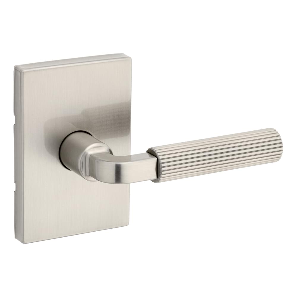 Kwikset 720MALRCT-4 Mirada Reeded Pattern Lever with Contemporary Rectangular Rose Passage Door Lock with 6AL Latch and RCS Strike Satin Brass Finish.