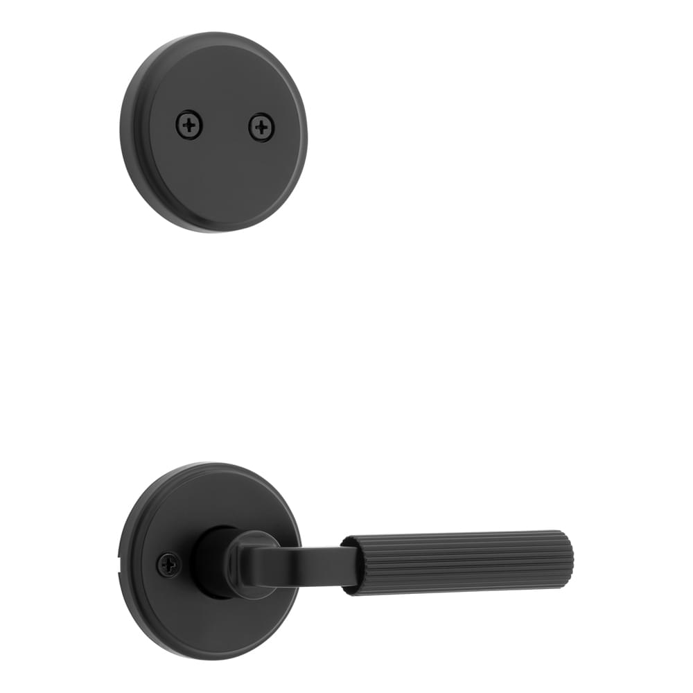 Kwikset 973MAL-514 Dummy Interior Mirada Reeded Pattern Lever with Traditional Round Rose Trim Matte Black Finish.