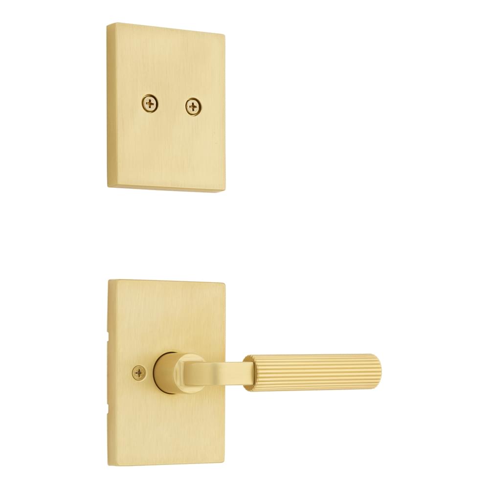 Kwikset 973MALRCT-4 Dummy Interior Mirada Reeded Pattern Lever with Contemporary Rectangular Rose Trim Satin Brass Finish.