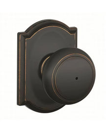 Schlage F40AND716CAM Andover with Camelot Rose Privacy Door Knob Aged Bronze.